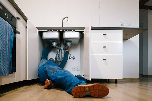 Professional Drain Cleaning technician working in Woodstock, GA